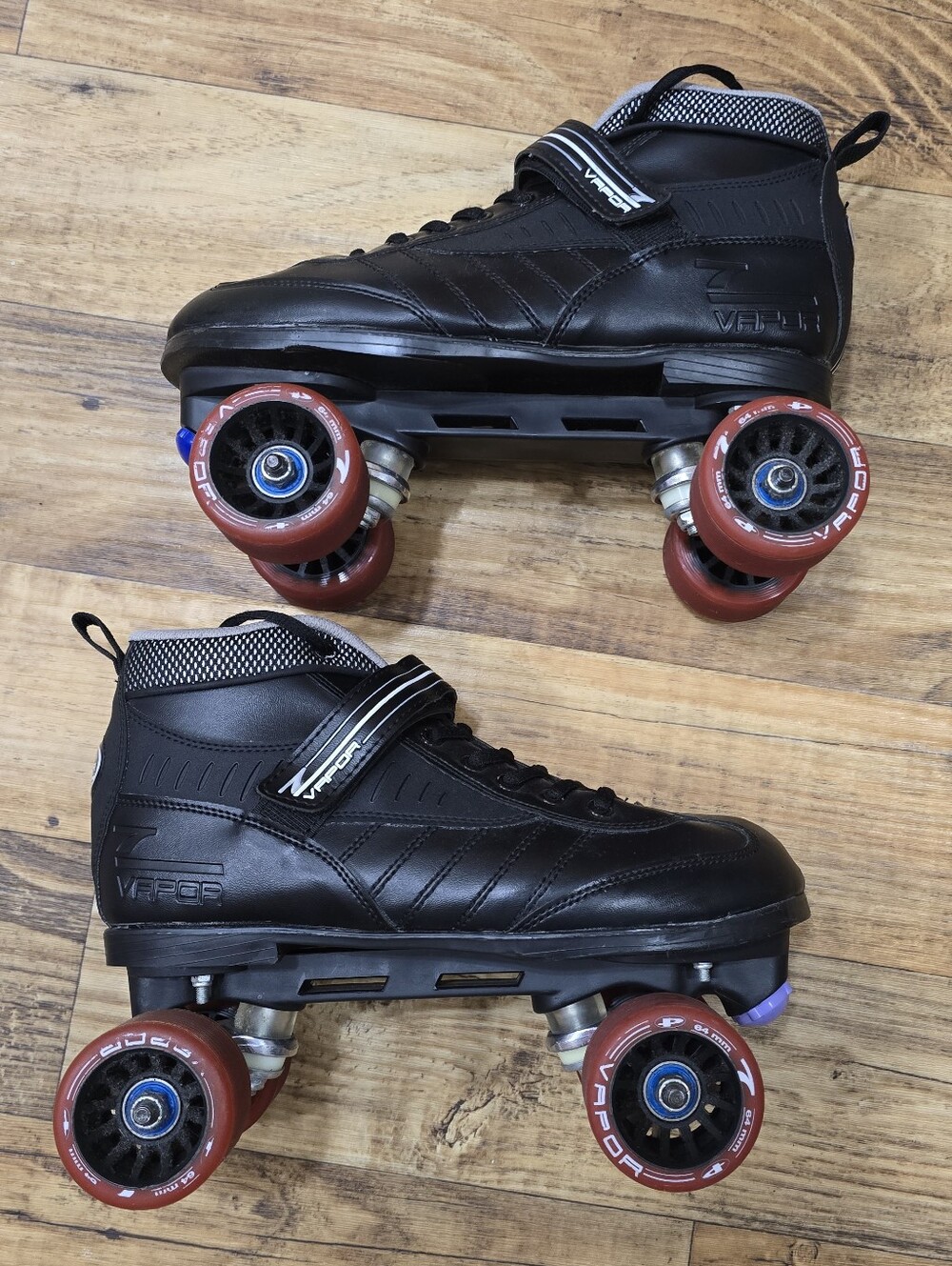 Mens Black Pacer Vapor 7 Quad Roller Skates with Red Wheels -